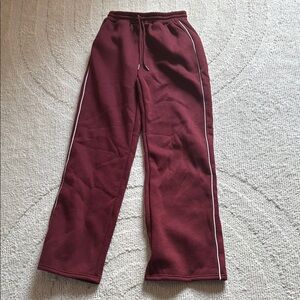 DO NOT BUY  ❌❌


Maroon Track Pants with White Stripe